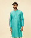 alt message - Manyavar Men Tropical Blue Diamond Patterned Kurta Set image number 0